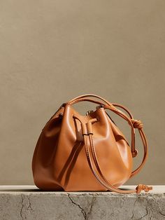 Saw this on Banana Republic: Bucket Tote, Saddle Brown, Leather Bucket Bag, Leather Bucket, Drawstring Pouch, Cute Bags, Stylish Bag, Womens Purses, Clutch Purse