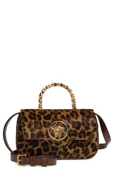 A rigid curb-chain top handle adds complementary gleam to the leopard-patterned calf hair exterior of this more rectangular version of the classic mini La Medusa bag. Magnetic-snap flap closure Top carry handle; removable, adjustable crossbody strap Interior card slot Structured silhouette with flat base for stability Lambskin-leather lining Genuine calf hair Made in Italy Designer Handbags Designer Rectangular Bag In Leopard Print, Luxury Leopard Print Bags For Formal Events, Luxury Tortoiseshell Rectangular Bags, Versace Handbags Purses, Luxury Leopard Print Top Handle Bag, Versace Small Backpack, Versace Gold Purse, Versace Handbags Farfetch, Luxury Leopard Print Rectangular Bag