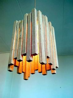 a wooden chandelier hanging from the ceiling