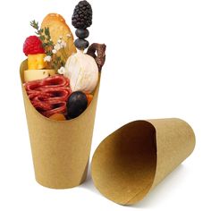 a paper cup filled with different types of food