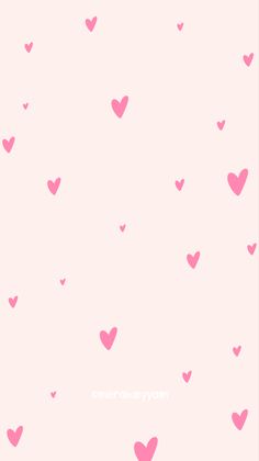 pink hearts are flying in the air