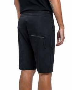 Side zipper shorts in black made from 100% stretchy cotton with front zip opening and drawstring belt for the perfect fit. Subtle vertical stitch detailing, long side zip pockets and inner secondary pockets to keep valuable items safe. Side zipper shorts in black low back zip pocket. • 100% cotton Functional Cotton Shorts With Built-in Shorts, Short Cotton Bottoms With Zipper Closure, Cotton Bottoms With Zipper Closure In Short Style, Cotton Shorts With Zipper Closure, Techwear Cotton Shorts With Built-in Liner, Cotton Techwear Shorts, Techwear Cotton Shorts, Sporty Cotton Shorts With Belt Loops, Sporty Cargo Shorts With Belt Loops