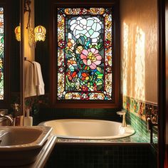 a bath tub sitting under a stained glass window in a bathroom next to a sink