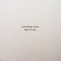 a white wall with the words everything comes back to you