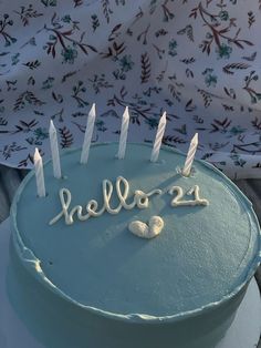 a cake with candles that say hello 22