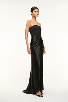 The Wayfaring Dress is a timeless evening gown with a ponte bodice and a ruched satin skirt. This strapless dress features a strapless bra-friendly bodice, with an open lower back. Strapless Corset Dress, Satin Skirt, Strapless Bra, Lower Back, Size 00, Black Satin, Evening Gown, Dress Black, Evening Gowns