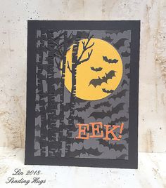 a halloween card with bats and the word eek on it