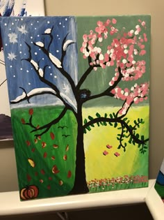 two paintings one is a tree and the other is a bird