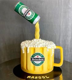 a beer mug cake is being poured into it