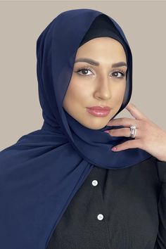 Our Luxury Chiffon hijab-Dark Slate is perfect for every occasion. With the softest chiffon fabric we could find, our Luxury Chiffon will become your go to hijab whether you're going out to a fancy party or keeping it casual, looking beautiful is effortless! Fabric: Polyester Chiffon Dimension: 70" x 27" Contour: Long Rectangle Thickness: Light Texture: Smooth Care: Machine or hand wash in warm water, tumble dry or air dry, iron if needed. Elegant Solid Niqab For Eid, Elegant Niqab For Eid, Elegant Chiffon Headscarf For Eid, Elegant Chiffon Khimar For Eid, Elegant Chiffon Headscarf, Solid Color Chiffon Hijab In Modest Style, Solid Chiffon Hijab Modest Style, Modest Solid Color Chiffon Hijab, Elegant Solid Color Chiffon Hijab