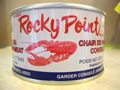 a can of crab meat sitting on top of a counter