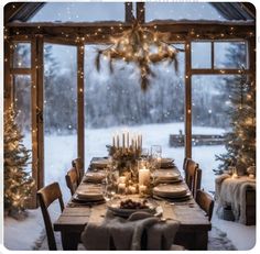 a dining room table is set with candles and christmas trees in front of an open window