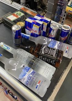 several different types of beverages are on the counter