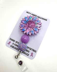 Purple sunflower retractable badge reel with matching beads and rhinestone gem Acrylic pieces are fragile and may easily break if dropped on a hard surface Purple Sunflower, Medical Gifts, Name Badges, Retractable Badge Reel, Functional Accessories, Id Holder, Badge Holders Lanyard, Gift Accessories, Badge Reel