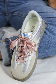 Add a touch of luxury to any pair of shoes with our high-quality satin shoelaces. Their narrow width and glossy finish make them perfect for both formal and casual styles, transforming your sneakers or dress shoes into a statement piece. Available in a variety of chic colors, these laces offer a sophisticated look and durable performance. Ideal for those who appreciate both style and quality! Metallic Lace-up Sneakers, Silver Sneakers With Laces For Spring, Sporty Spring Sneakers For Party, Elegant Synthetic Sneakers For Spring, Trendy Party Sneakers With Laces, Elegant Lace-up Sneakers For Party, Metallic Lace-up Sneakers For Party, Elegant Low-top Synthetic Lace-up Shoes, Elegant Low-top Lace-up Shoes