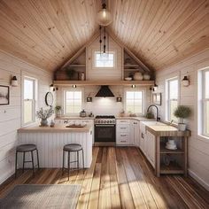 a kitchen with wood flooring and white walls is shown in this artist's rendering