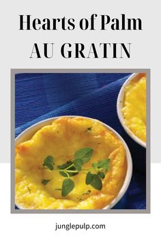 two small bowls filled with food on top of a blue table cloth and the words hearts of palm au gratin