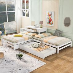 a living room filled with lots of white furniture