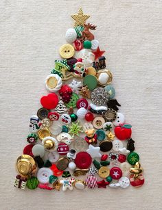 a small christmas tree made out of buttons