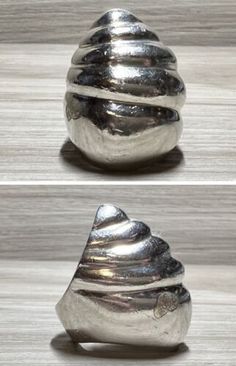 three different views of a silver object on a wooden surface, with one showing the top and bottom