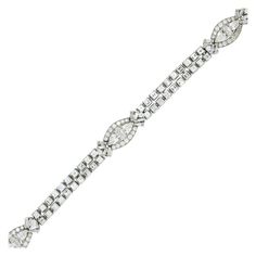 Oscar Heyman Brothers Diamond Bracelet | From a unique collection of vintage link bracelets at https://www.1stdibs.com/jewelry/bracelets/link-bracelets/ Diamond White Platinum Bracelet With Baguette Diamonds, Platinum Diamond Bracelet With Baguette Diamonds In Diamond White, Diamond White Baguette Cut Platinum Bracelet, Diamond Baguette Cut Tennis Bracelet, Diamond Tennis Bracelet With 17 Jewels And Baguette Cut, Timeless Platinum Tennis Bracelet With Baguette Diamonds, Platinum Tennis Bracelet With Baguette Diamonds, Coat Women Fashion, Antique Bracelets