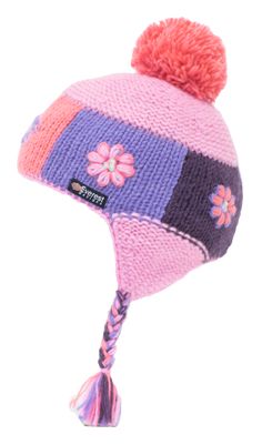 a pink and purple hat with flowers on the front, one pom - pom