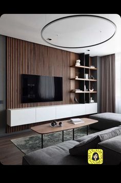 a modern living room with wood paneling and white furniture