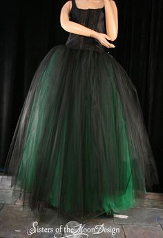 "Bridal Style tutu tulle skirt floor length! Made from 65+yards, five layers of soft smooth two black layers on top of three green layers on bottom Bridal tulle, all layers have been gathered and serged to the soft black fabric covered elastic waistband. This skirt is not made yet, It is made when ordered! Measurement: Sizes go by smallest waist size tutu will fit to largest Hips tutu fits over XSmall 24\"-34\"inches Small 26\"-38\"inches Medium 30\"-40\"inches Large 34\"-48\"inches XLarge 38\"- Tulle Crinoline Skirt For Costume Party, Crinoline Tulle Skirt For Costume Party, Black Tiered Skirt Dress For Wedding, Black Tiered Skirt Wedding Dress, Black Skirt With Attached Cancan For Wedding, Black Crinoline Skirt For Wedding, Black Long Tulle Petticoat, Black Tiered Skirt Petticoat For Wedding, Black Tiered Skirt For Wedding