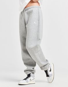 Take it easy with these women's Brooklyn Joggers from Jordan. In a Dark Grey Heather colourway, these standard fit joggers are cut from soft fleece fabric for everyday comfort. They feature an elasticated, drawcord waistband for a relaxed fit, with ribbed cuffs to hold the shape and side pockets for storage. Finished up with classic Jumpman branding. Machine washable | Our model is 5'8.5" and wears a size small. Grey Jordans, Madrid Barcelona, Fitted Joggers, As Roma, Take It Easy, Sunderland, Ac Milan, Jd Sports, Wales England