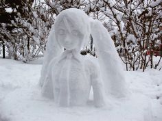 there is a snow sculpture in the yard