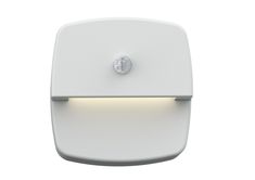 a white light that is on the side of a wall mounted device with a button