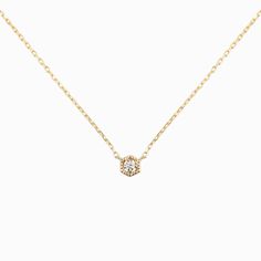 Vintage-style hexagon frame holds the center diamond with four prongs. The setting is hallowed and has a milgrain finish all around. This necklace is available in 2mm or 3mm diamonds. Hexagon width: 4.5mm for 2mm diamond, 6.0mm for 3mm diamond. Diamond weight: 0.03ct for 2mm, 0.10ct for 3mm Diamond quality: G color SI clarity Solid gold diamond cut chain 16 inches. Solid gold spring ring clasp closure Made of recycled solid 14k yellow gold, rose gold, white gold. Packaged in a recyclable kraft j Elegant Yellow Gold Octagon Diamond Necklace, Elegant Octagon Yellow Gold Diamond Necklace, Classic Yellow Gold Hexagon Jewelry, Classic Hexagon Yellow Gold Jewelry, Octagon Diamond Necklace With Single Diamond, Elegant 14k Gold Hexagon Necklace, Octagon Diamond Cut Necklace, Classic Yellow Gold Octagon Necklace, Elegant Hexagon Jewelry With Prong Setting