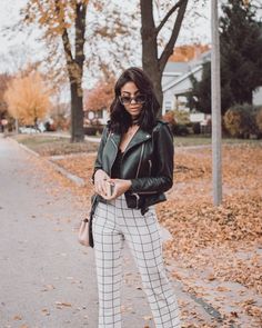 Black and white plaid pants with a black leather jacket. Visit Daily Dress Me at dailydressme.com for more inspiration women's fashion 2018, fall fashion, casual outfits, high rise pants, high waisted pants, women's blouses, school fashion, winter fashion, college, jackets, coats, leather coats White Plaid Pants Outfit, White Plaid Pants, Daily Dress Me, Plaid Pants Outfit, Trendy Winter Fashion, Autumn Outfits, Black Women Fashion