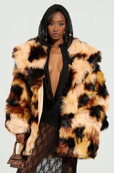 Take a walk on the wild side in The AKIRA Label Oversized Fur Coat. This fabulous coat is crafted from realistic, lux faux fur and features an oversized silhouette, a wide fold-over collar, long sleeves, spacious side seam pockets, a silky, satin-lined interior, and a hook and eye front closure. Style with a leather d Fur Coat Street Style, Oversized Fur Coat, Knee High Stiletto Boots, Walk On The Wild Side, Exotic Fashion, Stiletto Boots, Take A Walk, Oversized Silhouette, Leather Dress