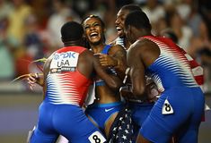 the olympic team is congratulating each other