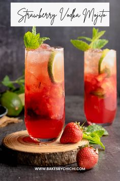 two glasses filled with strawberry vodka next to strawberries