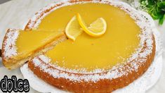 a lemon cake with powdered sugar on top