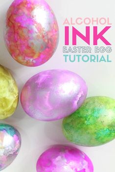 an image of painted easter eggs with the words alcohol ink on it in pink, yellow and green