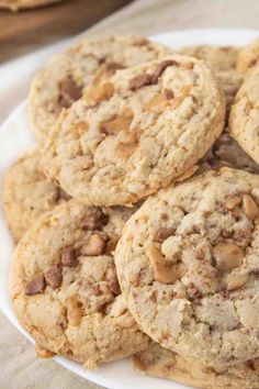 a white plate topped with cookies on top of a table