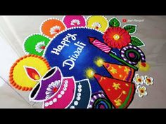 colorful rangolii with flowers and leaves on the floor for happy diwaling