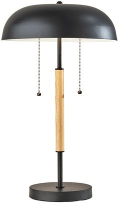 a black lamp with a wooden base on a white background