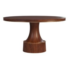 a round wooden table with an oval base