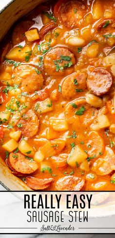 a pot of soup with text overlay that reads really easy sausage stew Kilbasa Sausage Recipes, Sausage Crockpot Recipes, Polish Sausage Recipes, Andouille Sausage Recipes, Sausage Crockpot, Sausage Recipes For Dinner, Sausage Soup Recipes, Sausage Stew