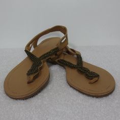 Tan Cut Out Heel Straps Sling-Back Bronze Beaded Thong Sandals By Forever 21 New Without Tags Sweet Summer Staple Sandals These Are An Essential Warm Weather Item Perfect For Dopamine Dressing They Have A Bit Of A Boho, Gypsy, Hippy, Festival Vibe In Neutral Tan Faux Leather With Bronze Beading Up Arch Versatile Pairing With Everything From Sundresses To Swimwear & Lots More Slide On With Sling-Back Heel Straps Cut-Out Heel Straps Have Elastic In Back For Comfortable Secure Fit Vegan Friendly Al Adjustable T-strap Sandals For Beach Party, Adjustable T-strap Sandals For Party And Beach Season, Adjustable Embellished Flip Flops For Summer, Forever 21 Summer Party Sandals, Forever 21 Open Toe Sandals For Vacation, Casual Beaded Sandals For Party, Summer Adjustable Beaded T-strap Sandals, Adjustable Embellished Sandals For Beach Season, Forever 21 Sandals For Spring Beach