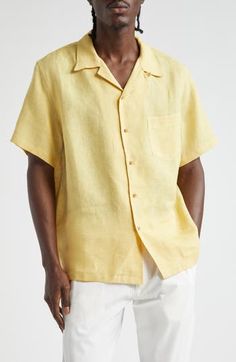 A relaxed silhouette underscores the easygoing aesthetic of this camp shirt crafted of linen that's been dyed using artisanal botanical dye. 28 1/2" length; 44" chest (size 48EU) Front button closure Convertible collar Short sleeves Chest patch pocket 100% linen Hand wash, line dry Made in France Designer Clothing Linen Camp Shirt With Camp Collar For Vacation, Casual Shirt With Natural Dye And Relaxed Fit, Linen Camp Shirt With Johnny Collar For Spring, Linen Camp Shirt With Camp Collar, Casual Flax Color Top With Spread Collar, Casual Flax-colored Top With Spread Collar, Casual Flax Top With Spread Collar, Casual Linen Shirt With Johnny Collar, Linen Camp Shirt With Spread Collar