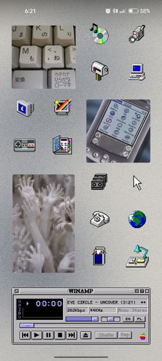 a computer screen with many different stickers and symbols on the back side of it