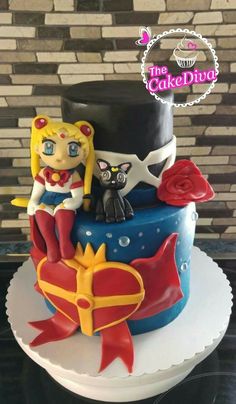 the cake is decorated with an image of sailor and her cat on it's side