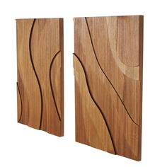 two pieces of wood with wavy designs on them