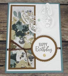 a close up of a greeting card with a butterfly on the front and an envelope that says happy birthday