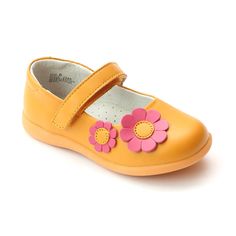 One of L'Amour's most modern mary janes, they are fun and super sporty! This tangerine color adds funky cool to any look. This style runs slightly larger and wider than our other mary janes, so size down when between sizes. Notes: Dual flower applique Velcro strap Sizes 5-13 (Toddler), 1-2 (Youth) Angel Baby Girl, Tangerine Color, Easter Outfit, Leather Mary Janes, Navy Leather, Flower Applique, Velcro Straps, T Strap, Kids Stuff